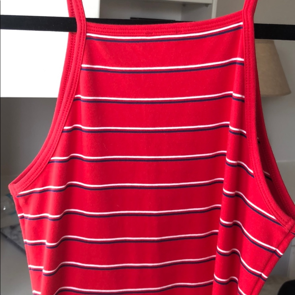 Red body-con dress with blue and white stripes